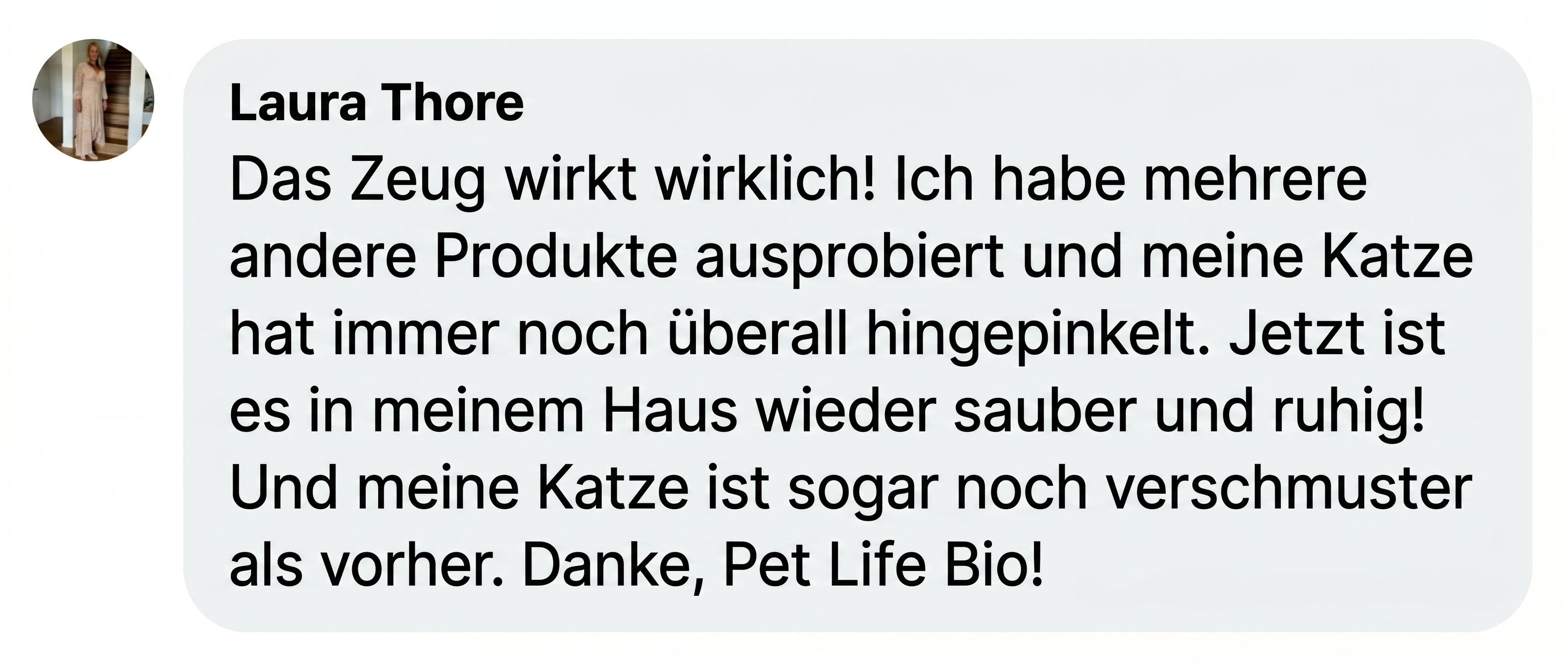 A screenshot of a customer review in German from Laura Thore, with her circular profile picture.