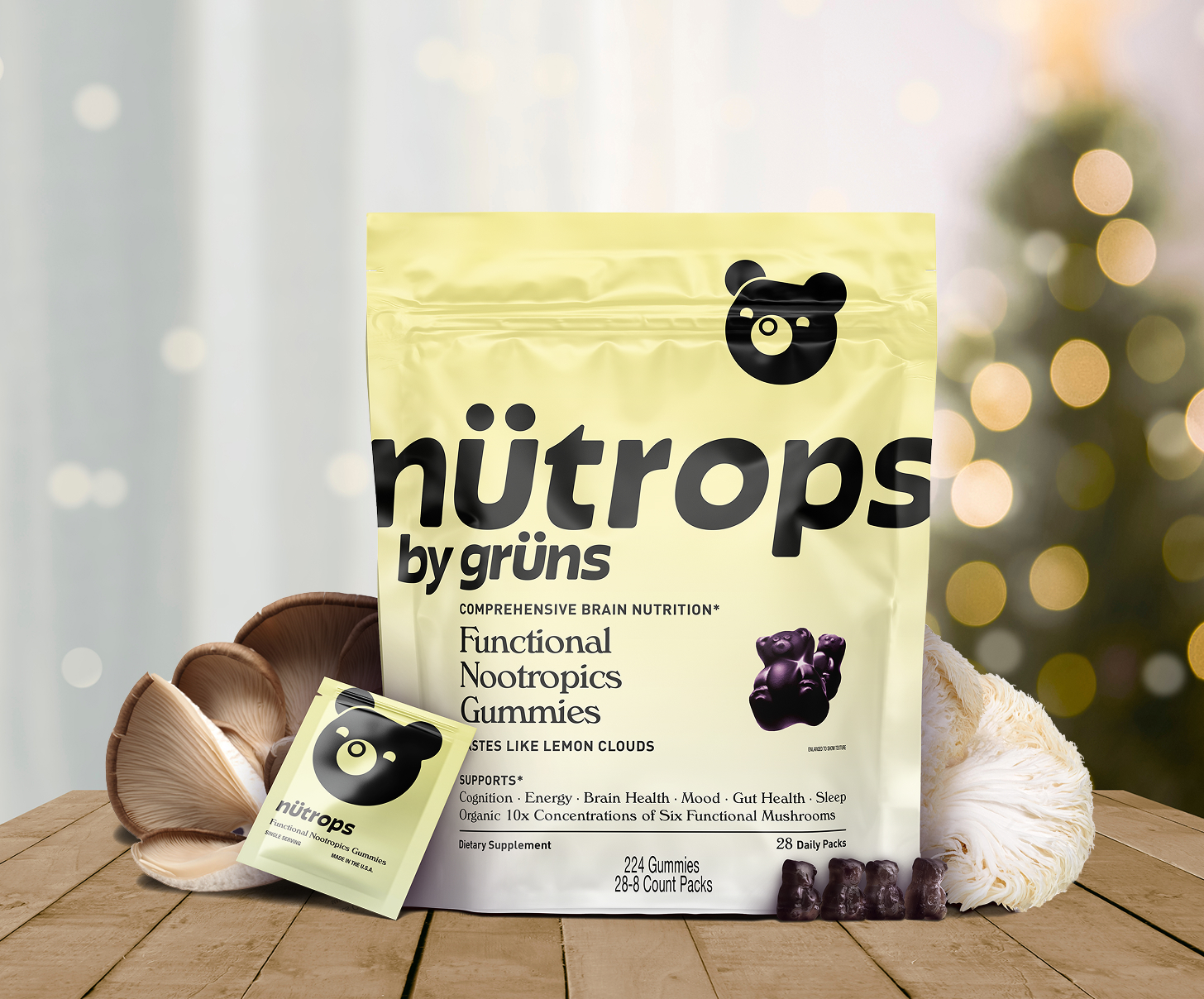 Package of functional nootropics gummies on a wooden surface with mushrooms.