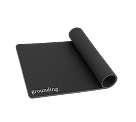 Rolled-out black mat with 'grounding' text on the corner.