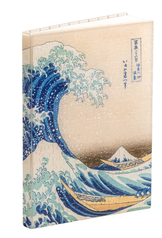Puzzle box featuring a famous wave artwork with boats and Mount Fuji.