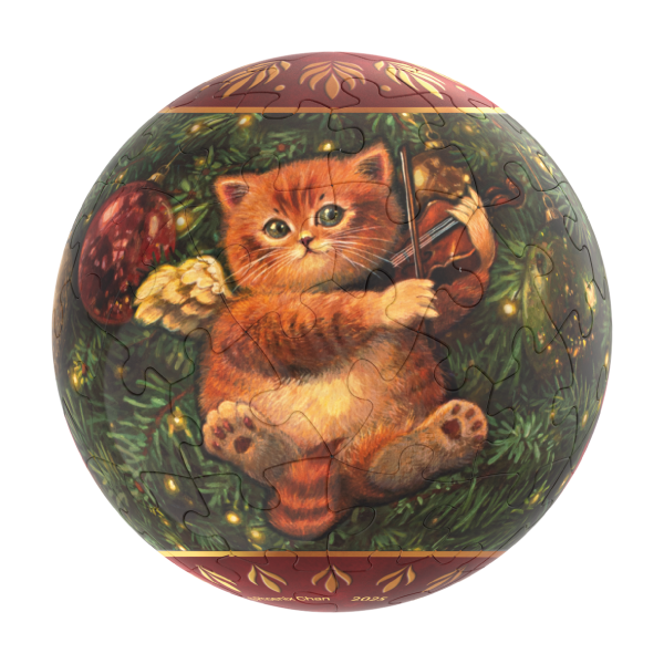 A spherical jigsaw puzzle depicting a winged ginger kitten playing a violin in front of a Christmas tree.