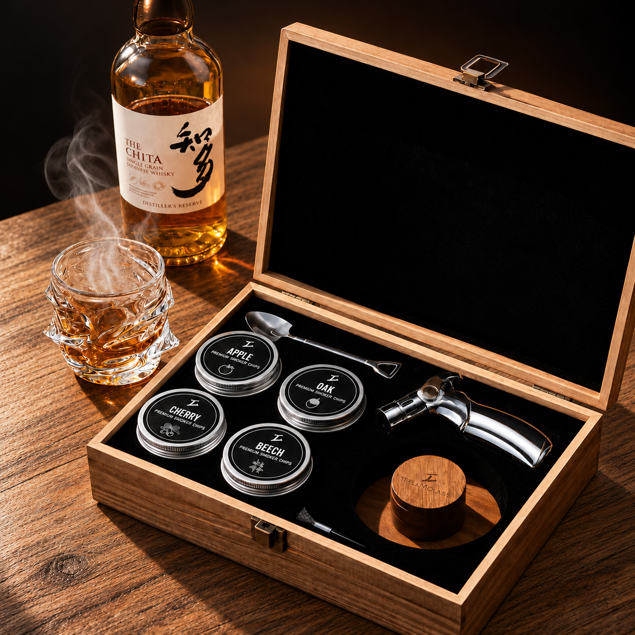 A cocktail smoker kit in a wooden box next to a bottle and a smoking glass of whisky.