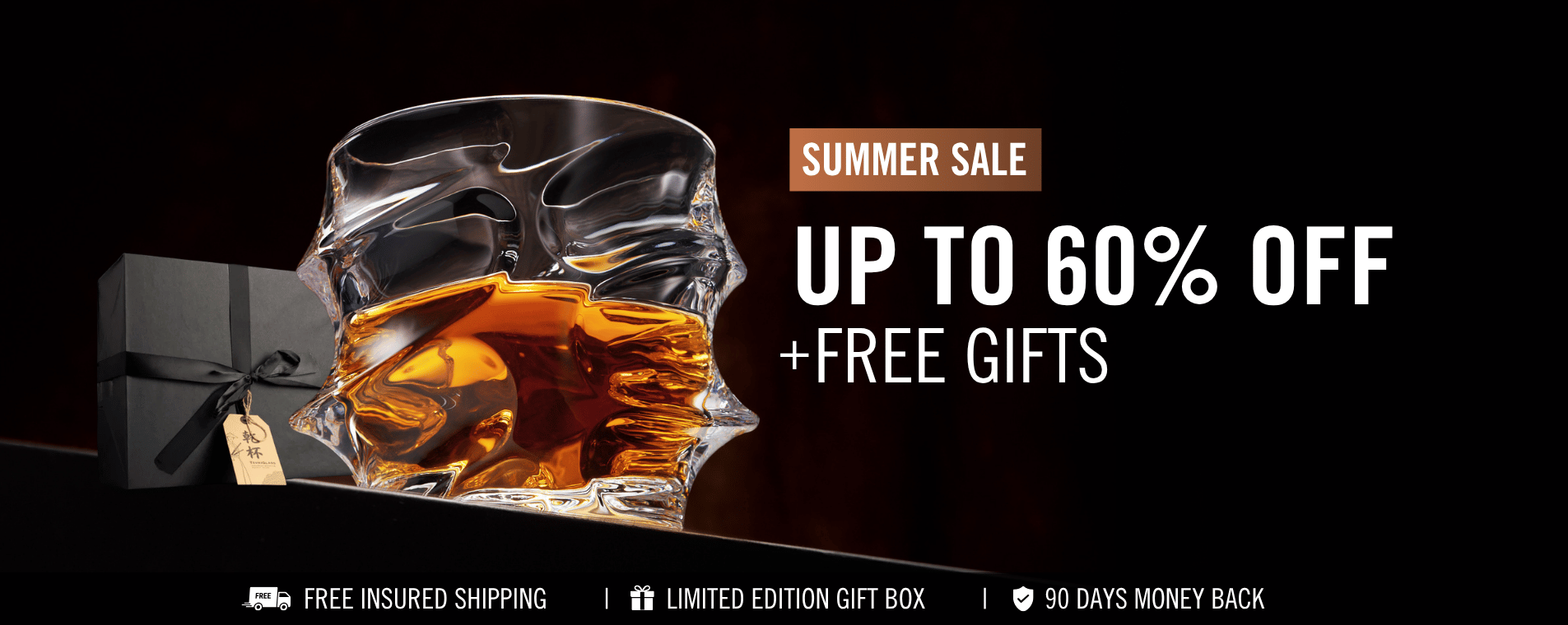 A sculptural glass of whiskey next to a black gift box, advertising a summer sale up to 60% off.