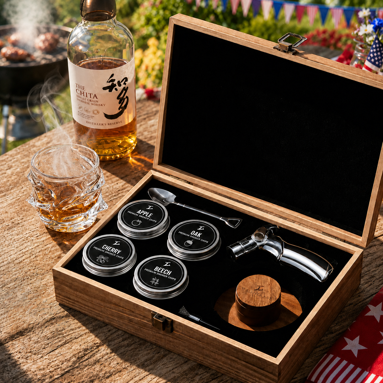 A cocktail smoker kit in a wooden box next to a bottle and a smoking glass of whisky.