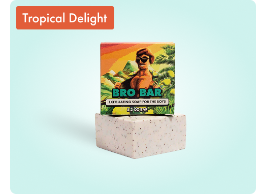 Soap bar with packaging labeled 'Bro Bar,' tropical background.