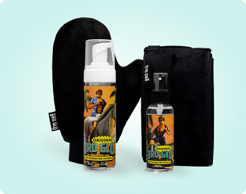 Tanning products and black applicator mitt against a light blue background.