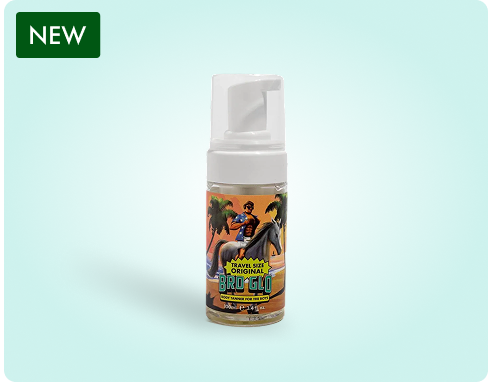 Bottle of travel-size equine shampoo with horse and rider illustration.