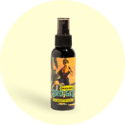 A bottle of 'Bro Glow' body spray with a colorful label.