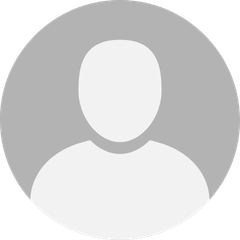 A circular placeholder icon showing a generic silhouette of a person's head and shoulders.
