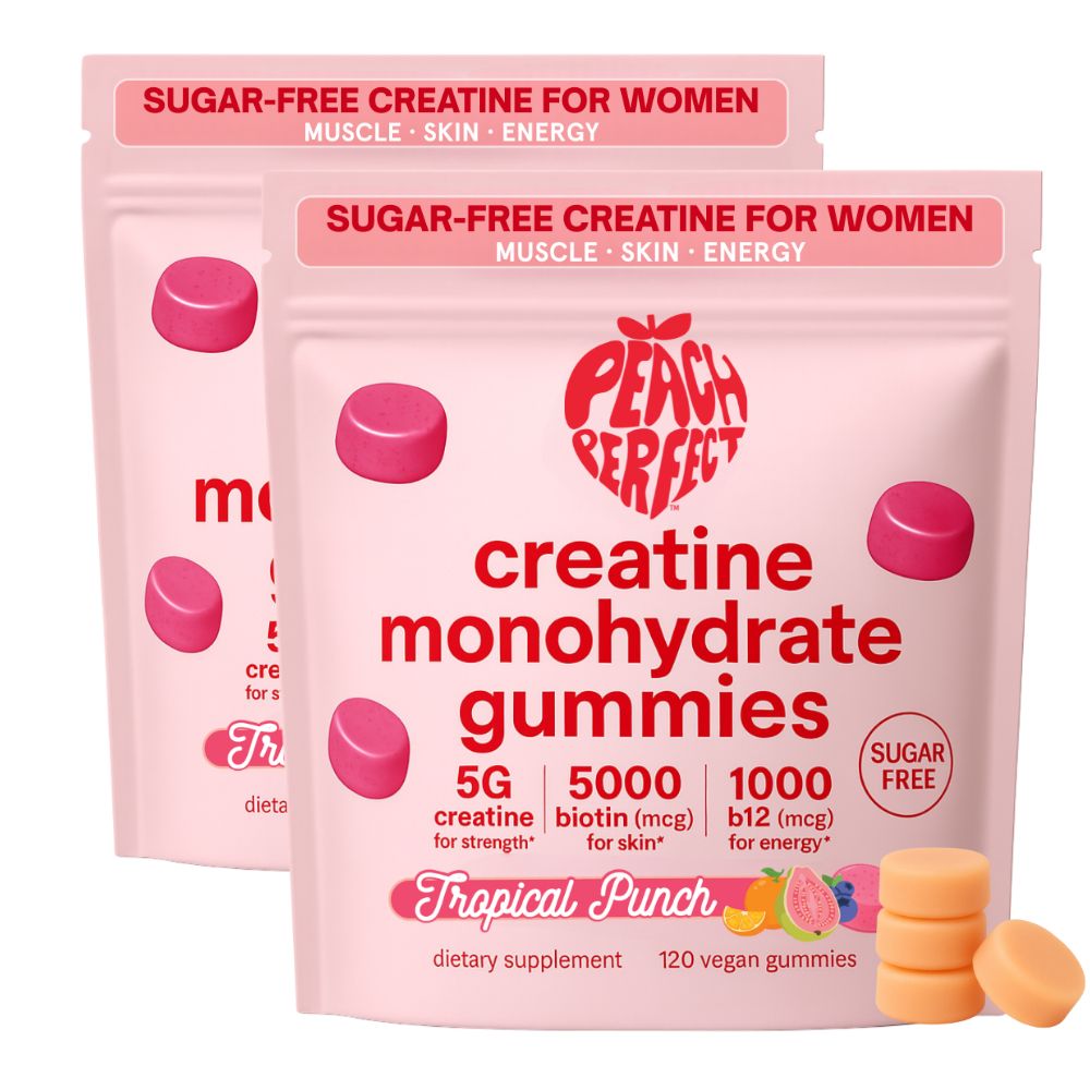 Two pink packages of creatine monohydrate gummies labeled 'Peach Perfect.'