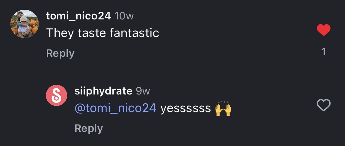 Social media comments with heart and raised hands emojis.