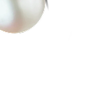 Close-up of a white, round object with black background.
