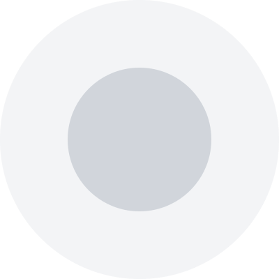 Gray circle on a light gray background, placeholder image.