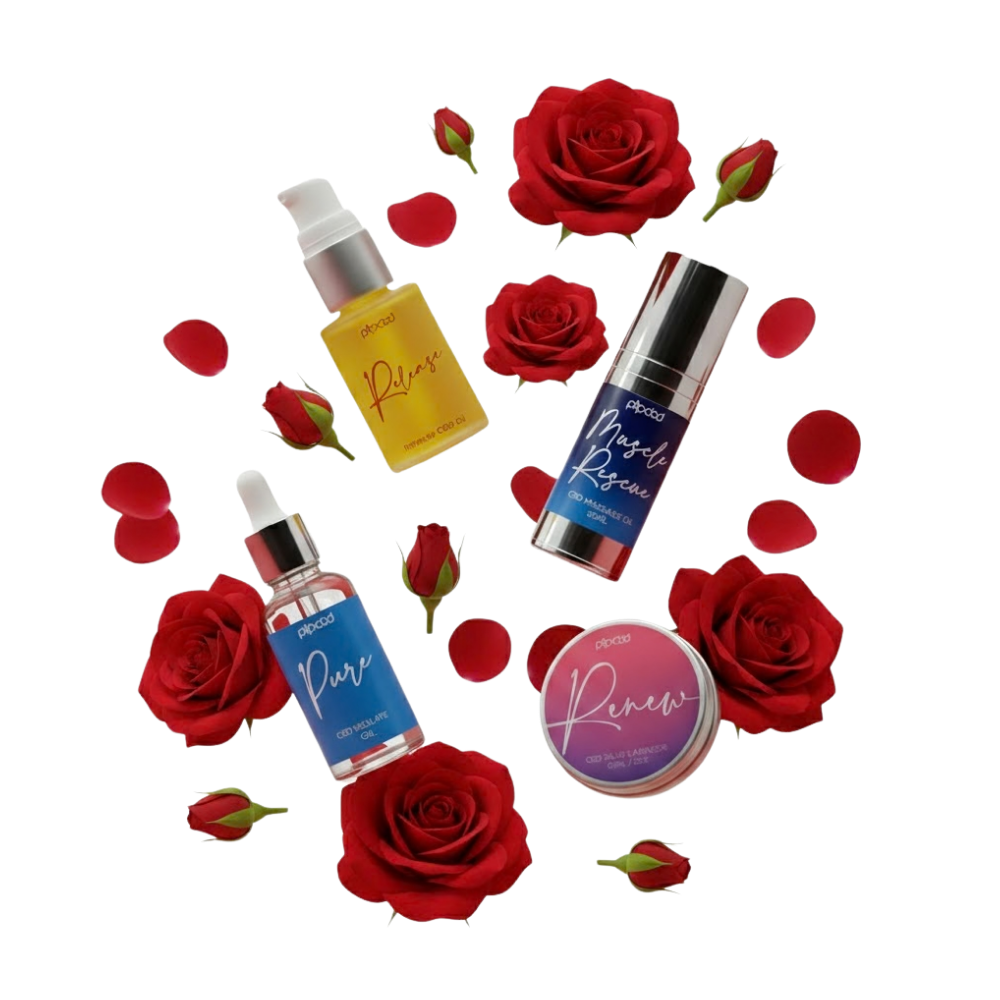 Several Pipcbd brand cosmetic products arranged with red roses and petals on a black background.
