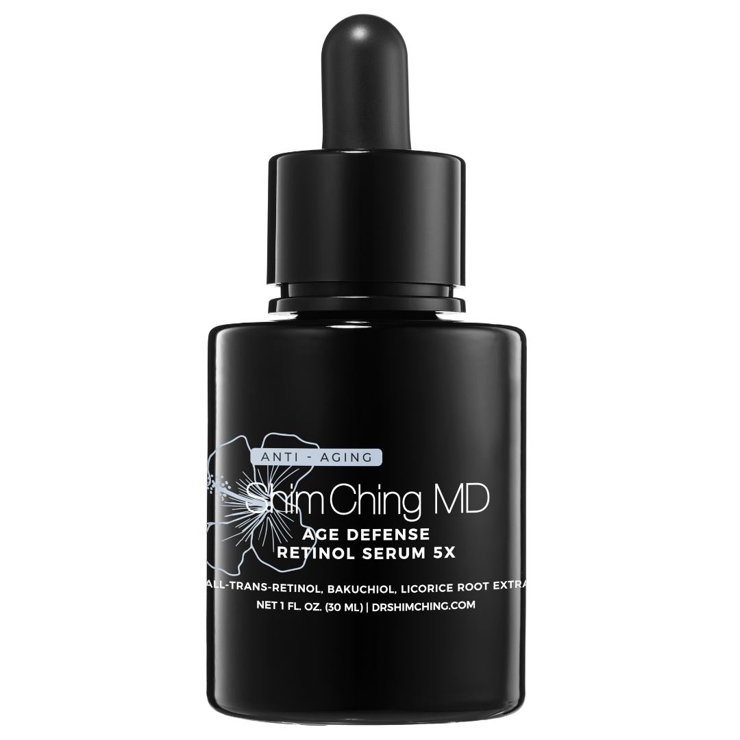 A black bottle of Shim Ching MD Age Defense Retinol Serum 5X with a dropper cap.