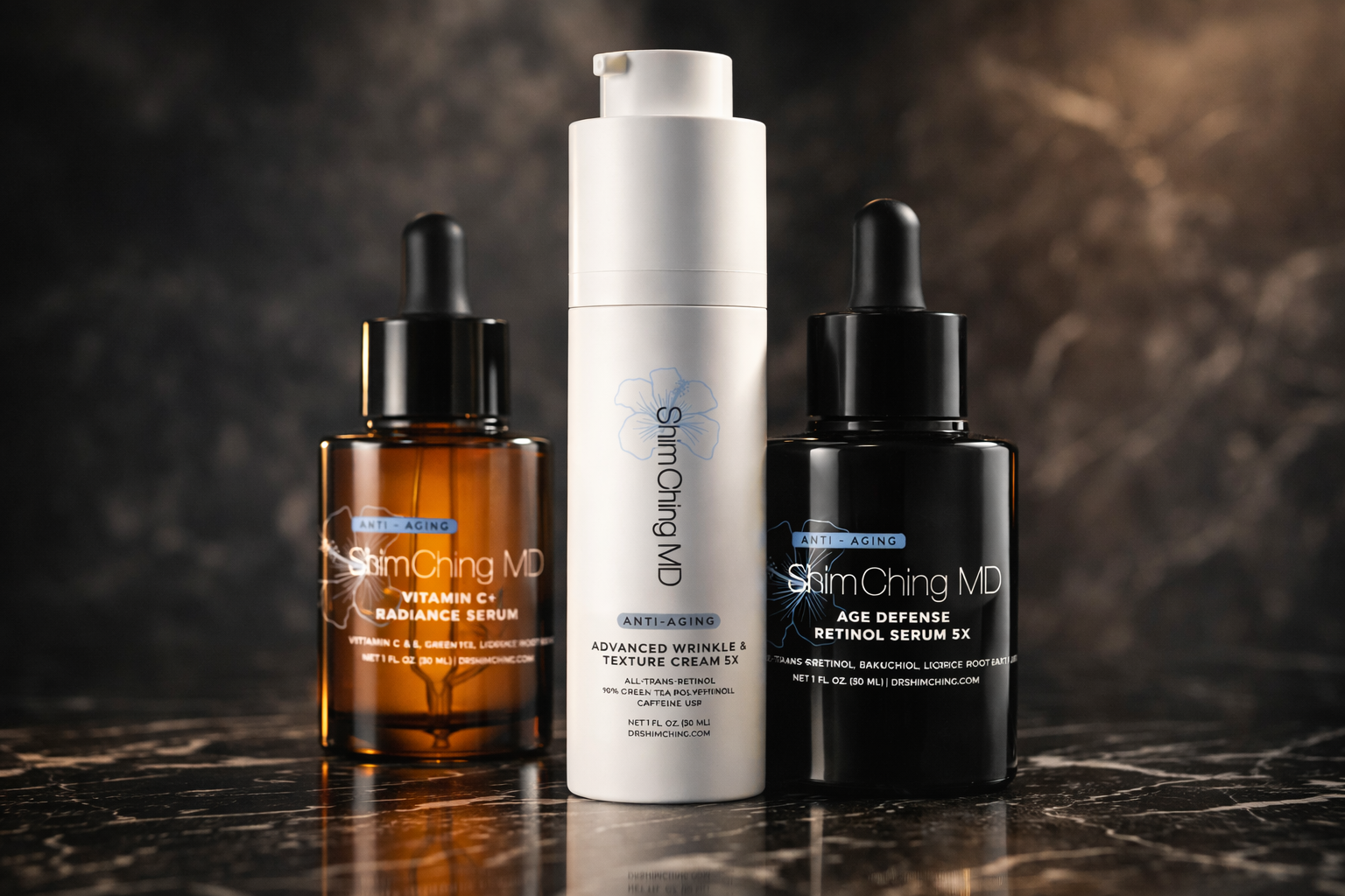 Three bottles of ShimChing MD anti-aging skincare products arranged on a dark marble surface.