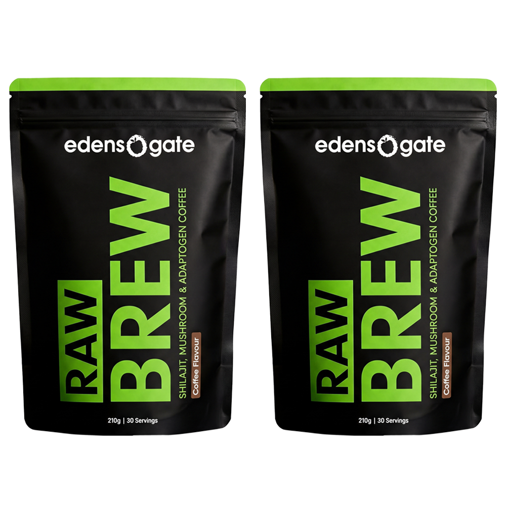 Two black and green pouches of Edens Gate Raw Brew coffee on a white background.