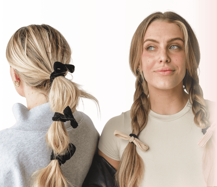 Two women with braided hairstyles and hair accessories.