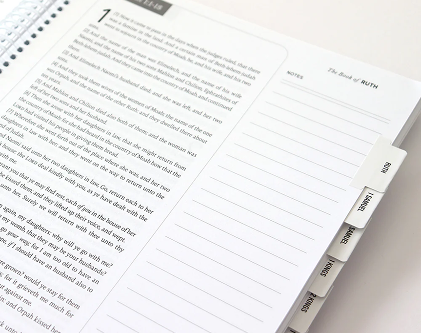 Open journal with text, lined notes section, and tabbed dividers labeled Ruth, Samuel, Kings.