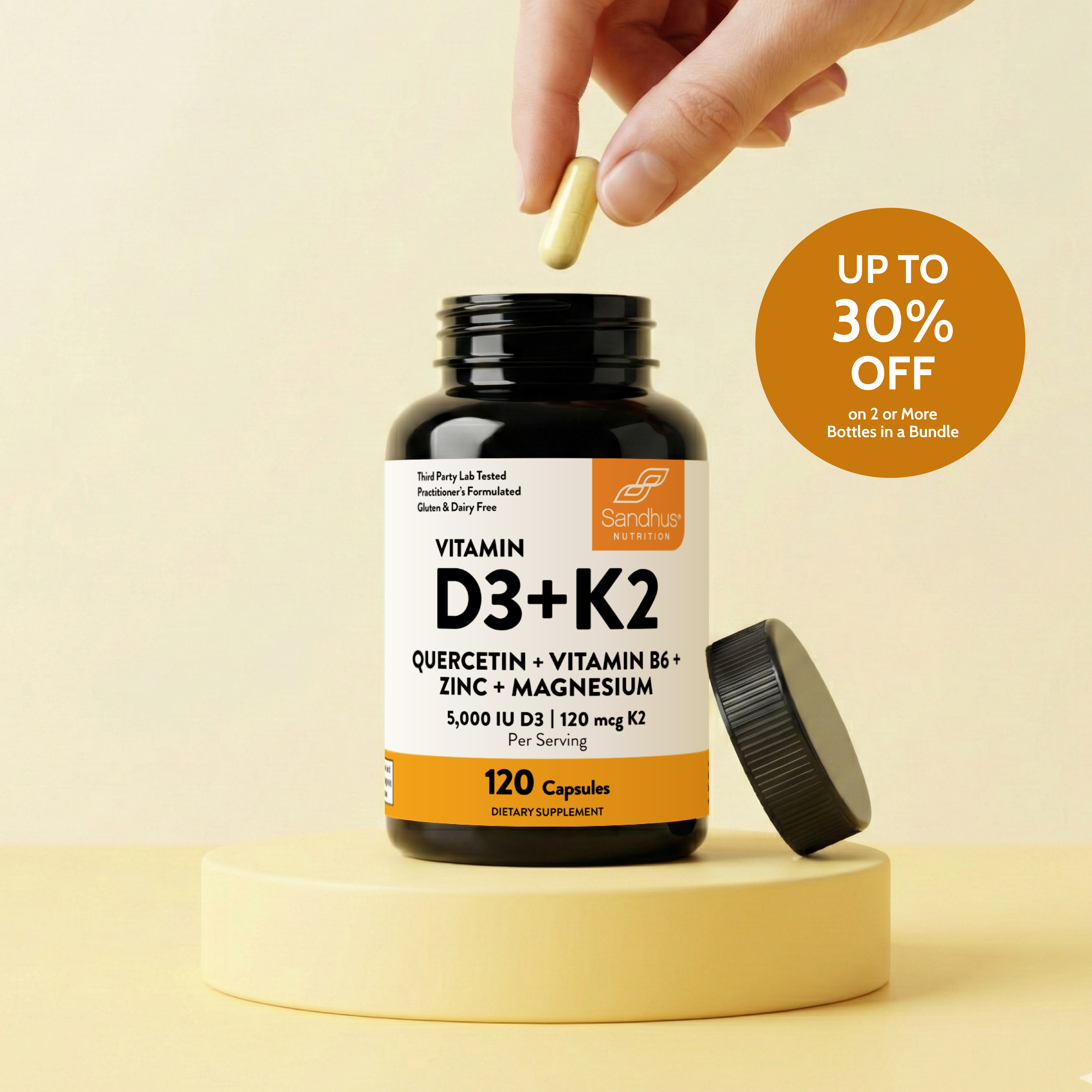 A hand places a capsule into a bottle of Sanhepto Liver Cleanse & Detox dietary supplement.