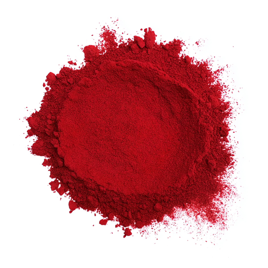 A pile of bright red powder on a white background.