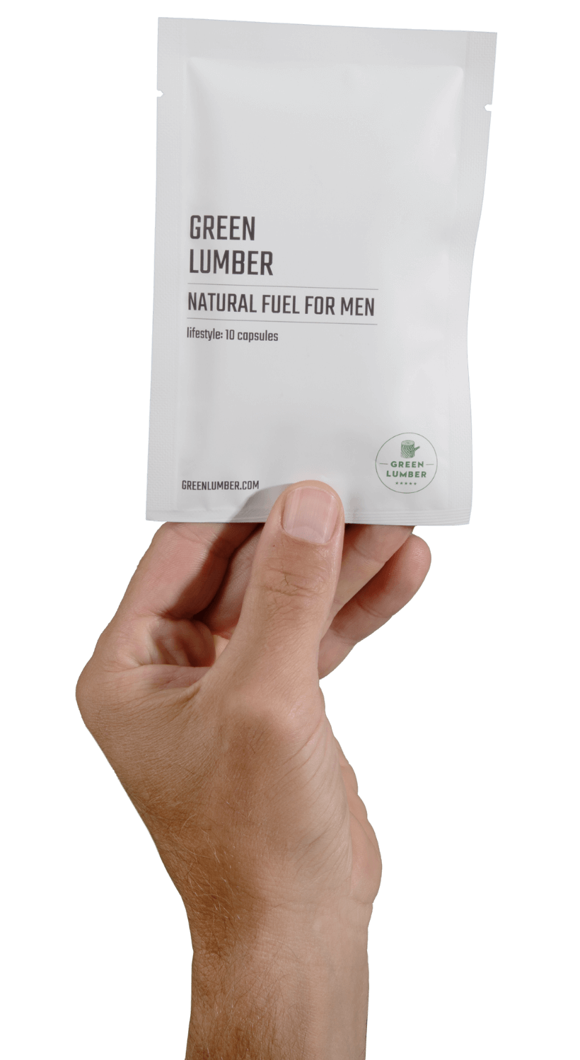 Hand holding a packet labeled 'Green Lumber Natural Fuel for Men.'