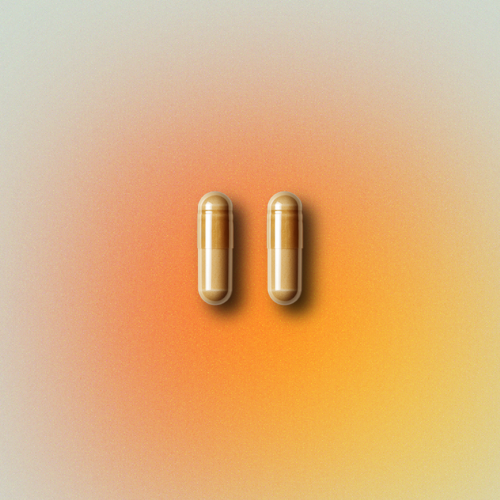 Two capsules on a gradient orange background.