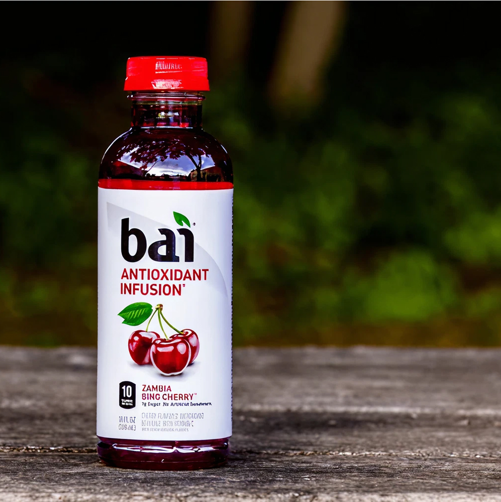 Bottle of Bai Antioxidant Infusion Zambia Bing Cherry on a wooden surface.