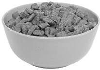 A grayscale image of a white bowl filled with small, chunky, irregular pieces.