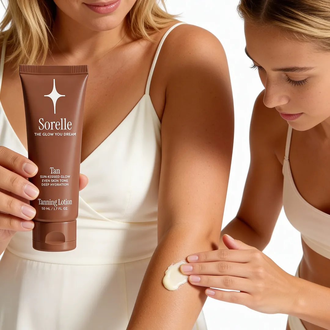 A woman holds a tube of Sorelle tanning lotion as another woman applies it to her arm.