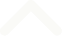 A white upward-pointing arrow on a black background.