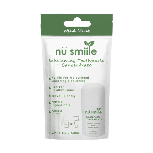 Packaging of nü smile whitening toothpaste concentrate in wild mint flavor.