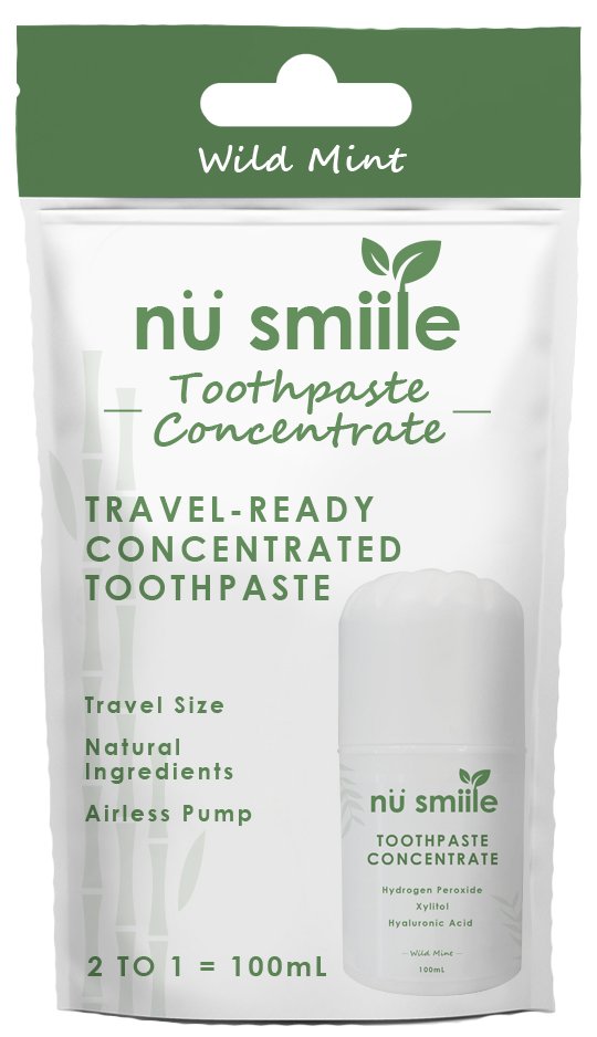 Packaging of travel-ready concentrated toothpaste, labeled 'nu smiile' with wild mint flavor.