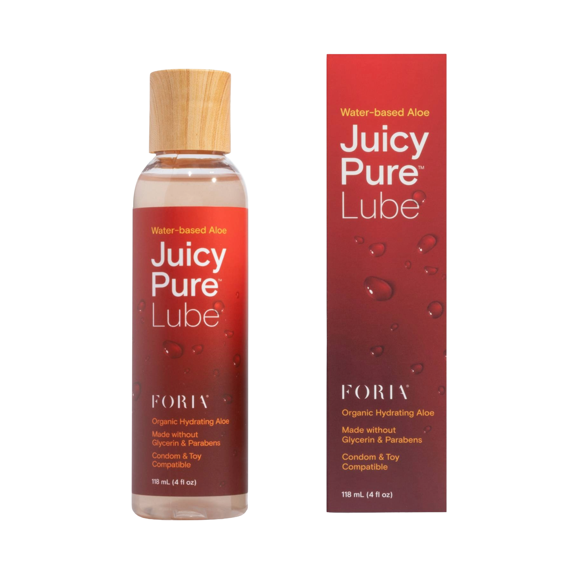 A bottle of Foria Juicy Pure Lube with a wooden cap, placed next to its red box.