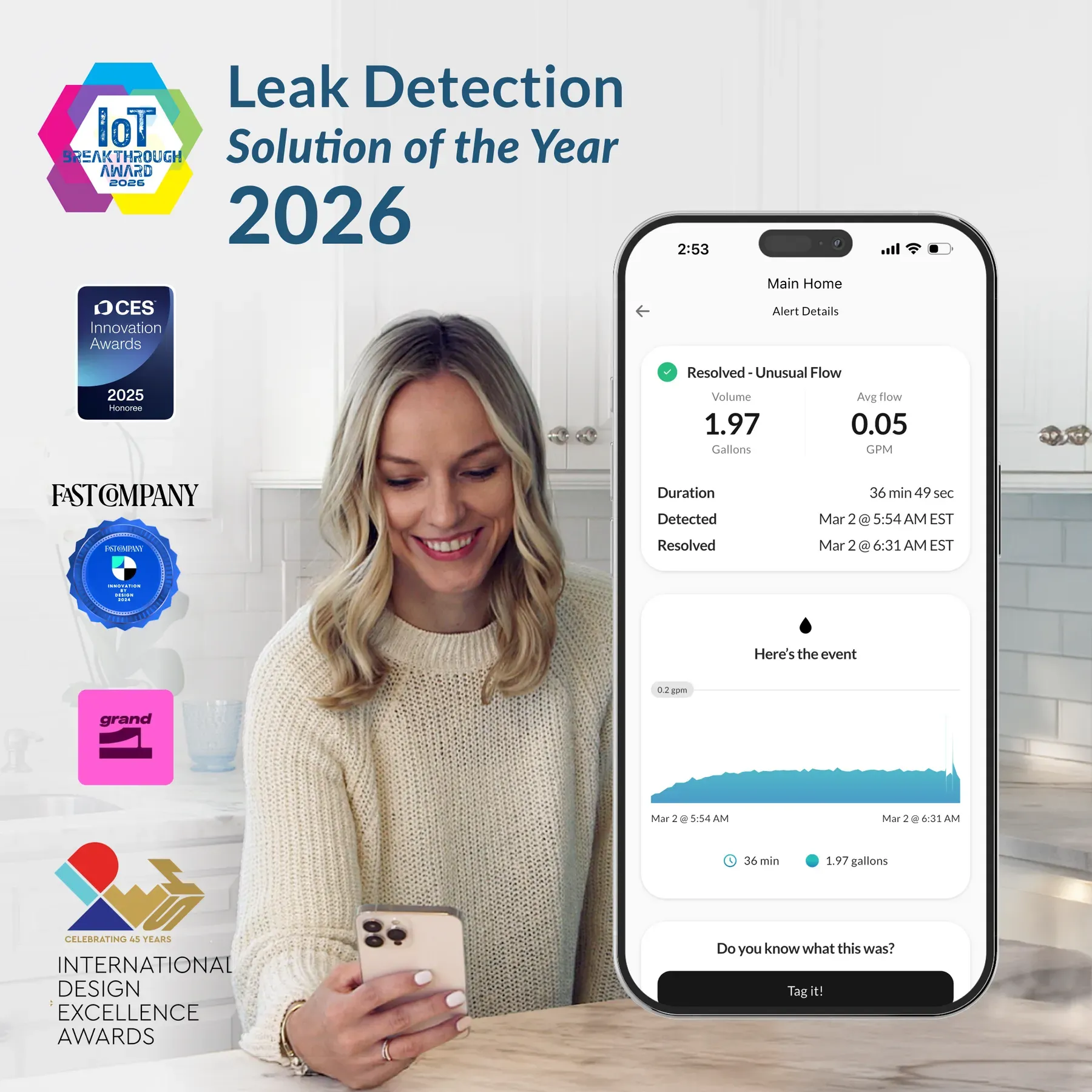 A smiling woman looks at her phone, which displays a leak detection app with a resolved alert.