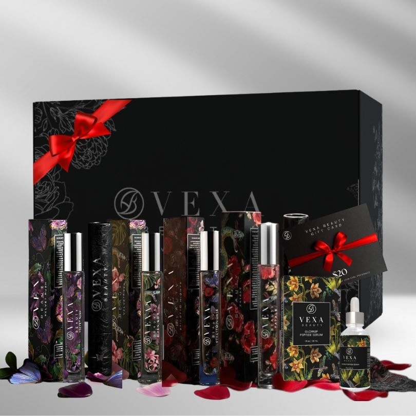 Collection of decorative Vexa beauty products with floral designs and a gift card.