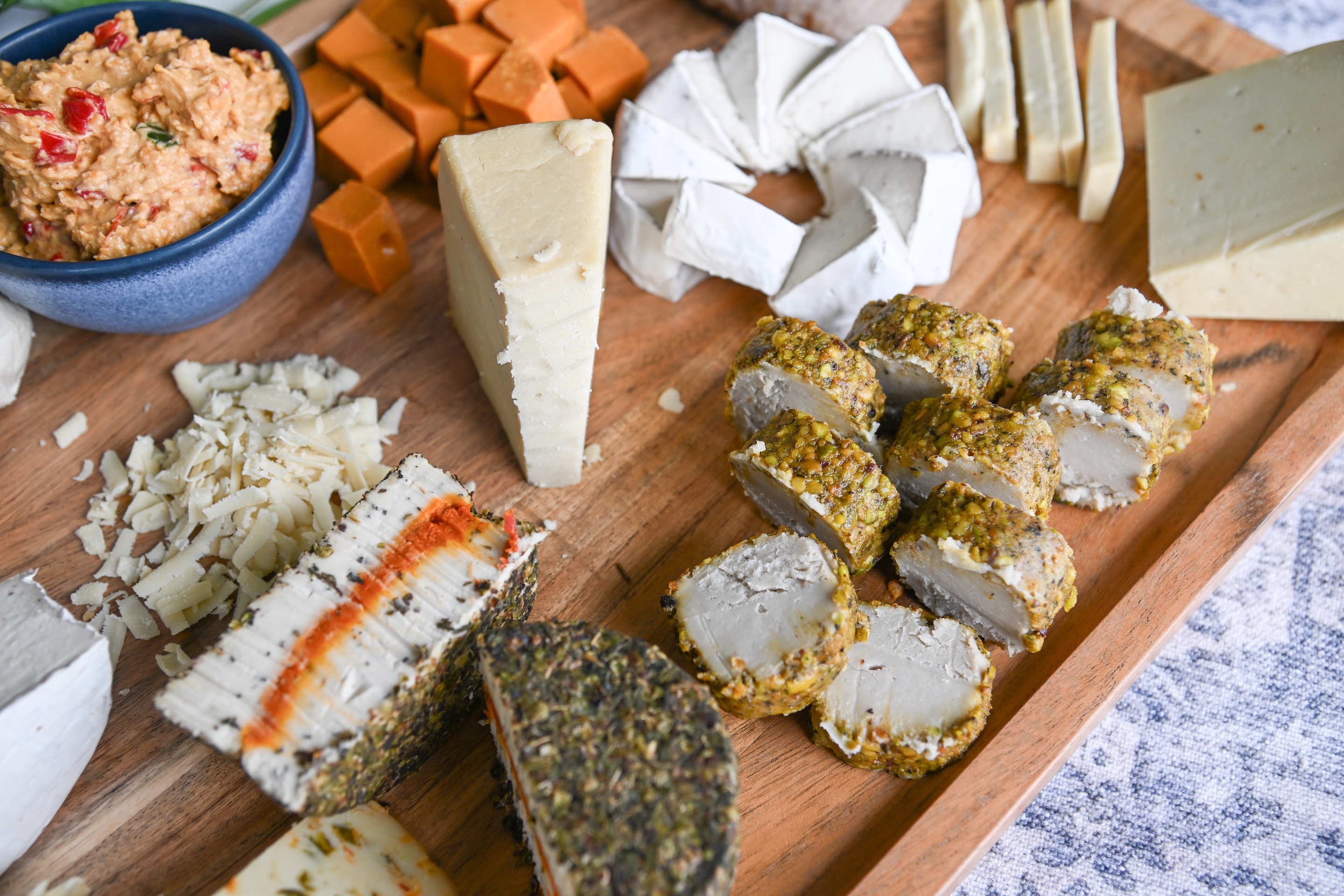 Arranged plant-based cheese on a cheeseboard