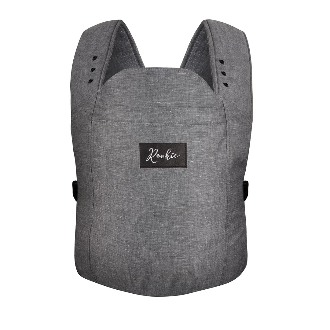 A front view of a grey fabric Rookie baby carrier with shoulder straps on a white background.