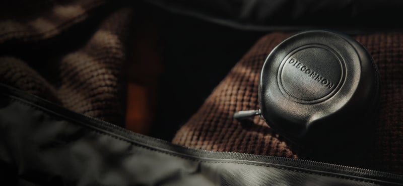 The Puck on a leather duffel