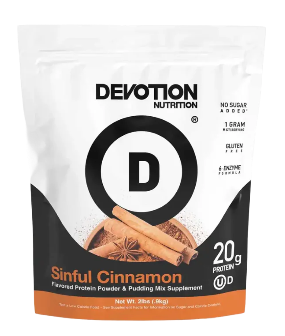 A white pouch of Devotion Nutrition's Sinful Cinnamon flavored protein powder and pudding mix on a white background.