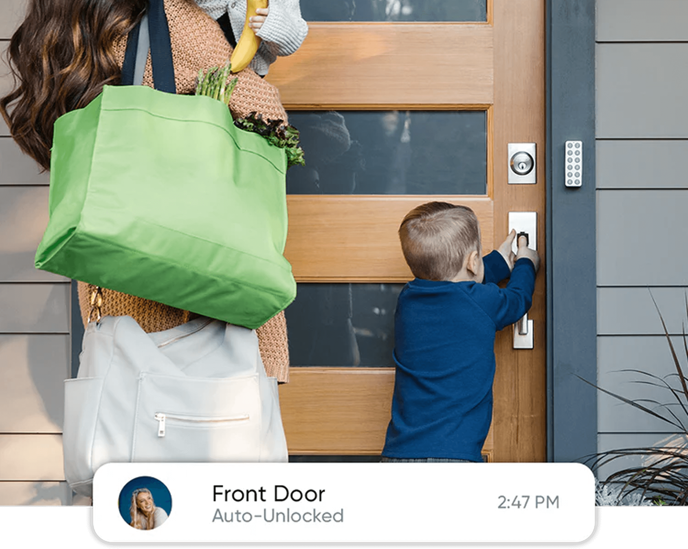 Child reaching for door handle, woman holding groceries beside him.