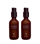 Two brown bottles of LUTEA face serum with black pump dispensers against a white background.