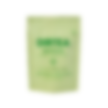 Blurry image of a green package with unreadable text.