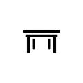 A simple black icon of a four-legged table on a white background.