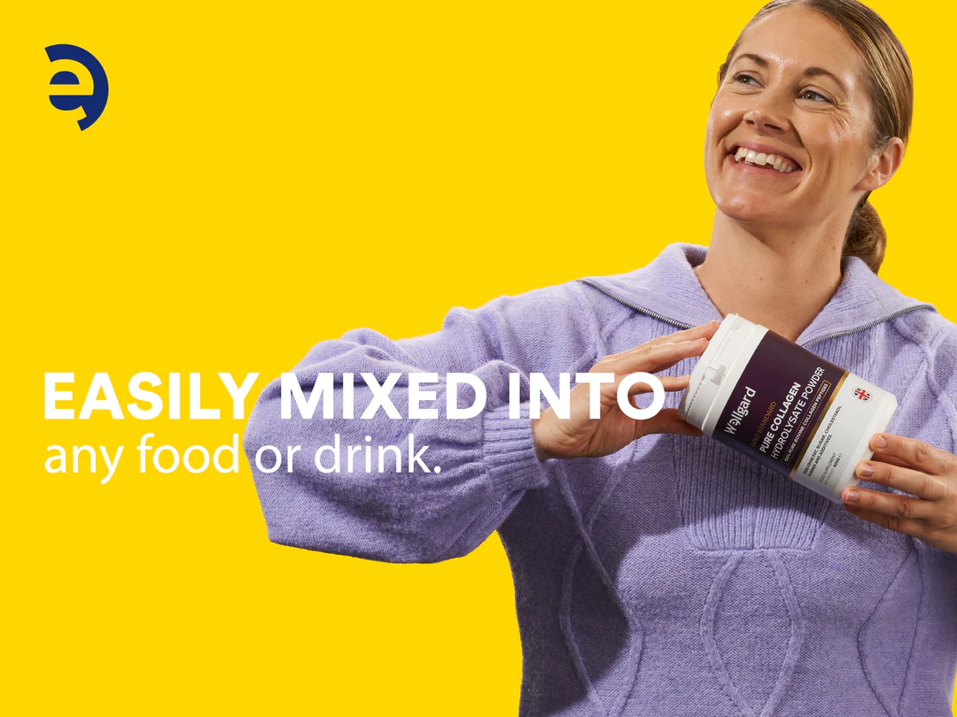 Person holding collagen powder container, smiling against yellow background.