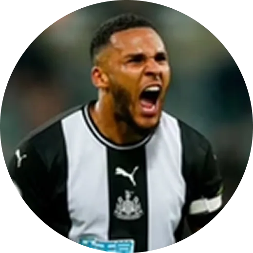 A circular photo of a male football player in a black and white striped jersey shouting.