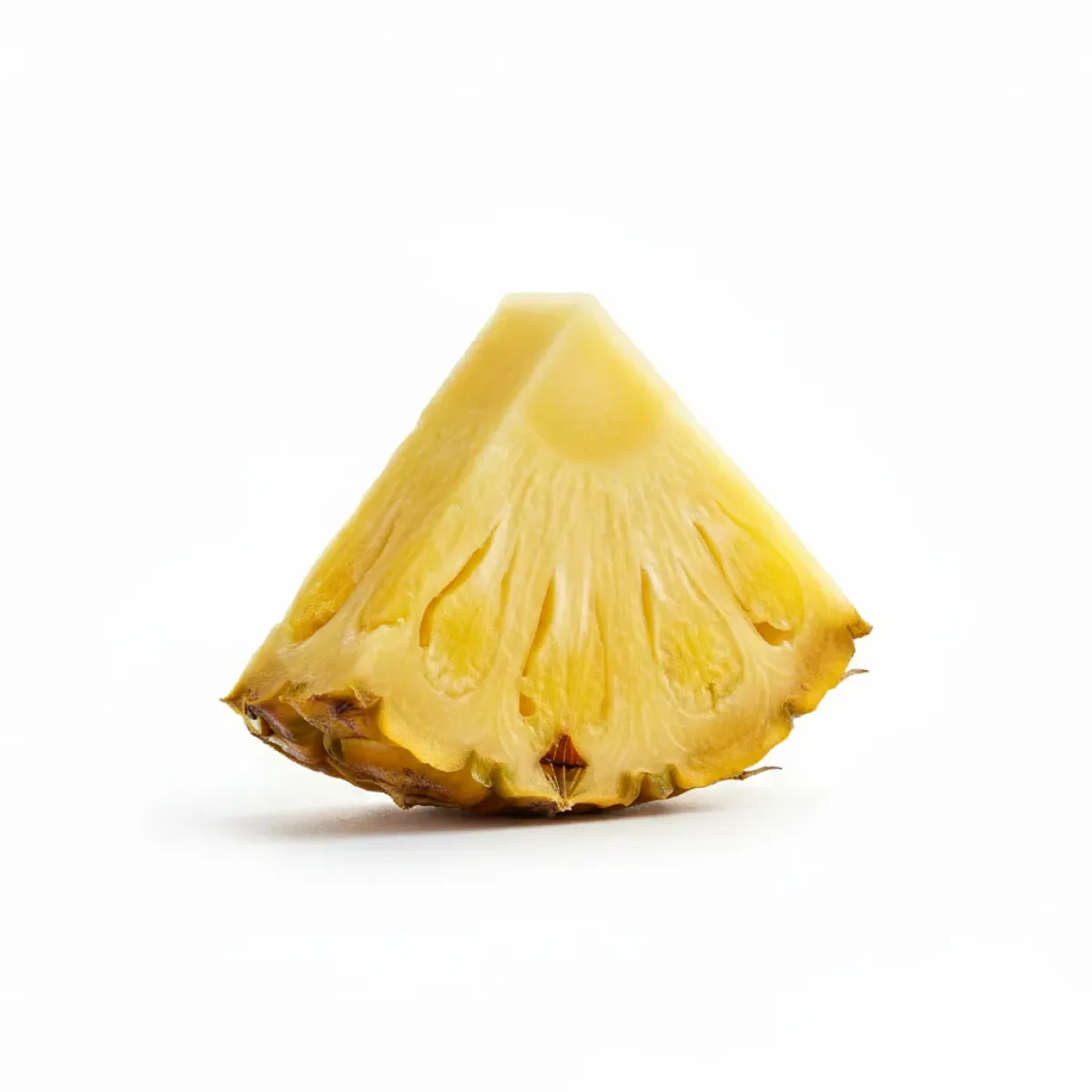 A single triangular wedge of fresh pineapple with its rind, isolated on a white background.