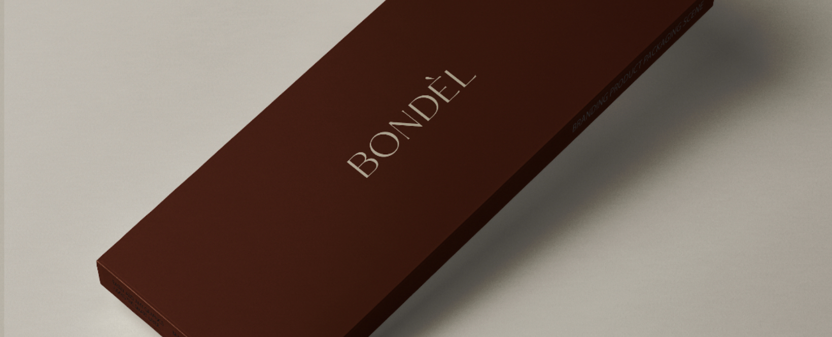 Dark brown rectangular box with the word 'BONDÈL' on it.