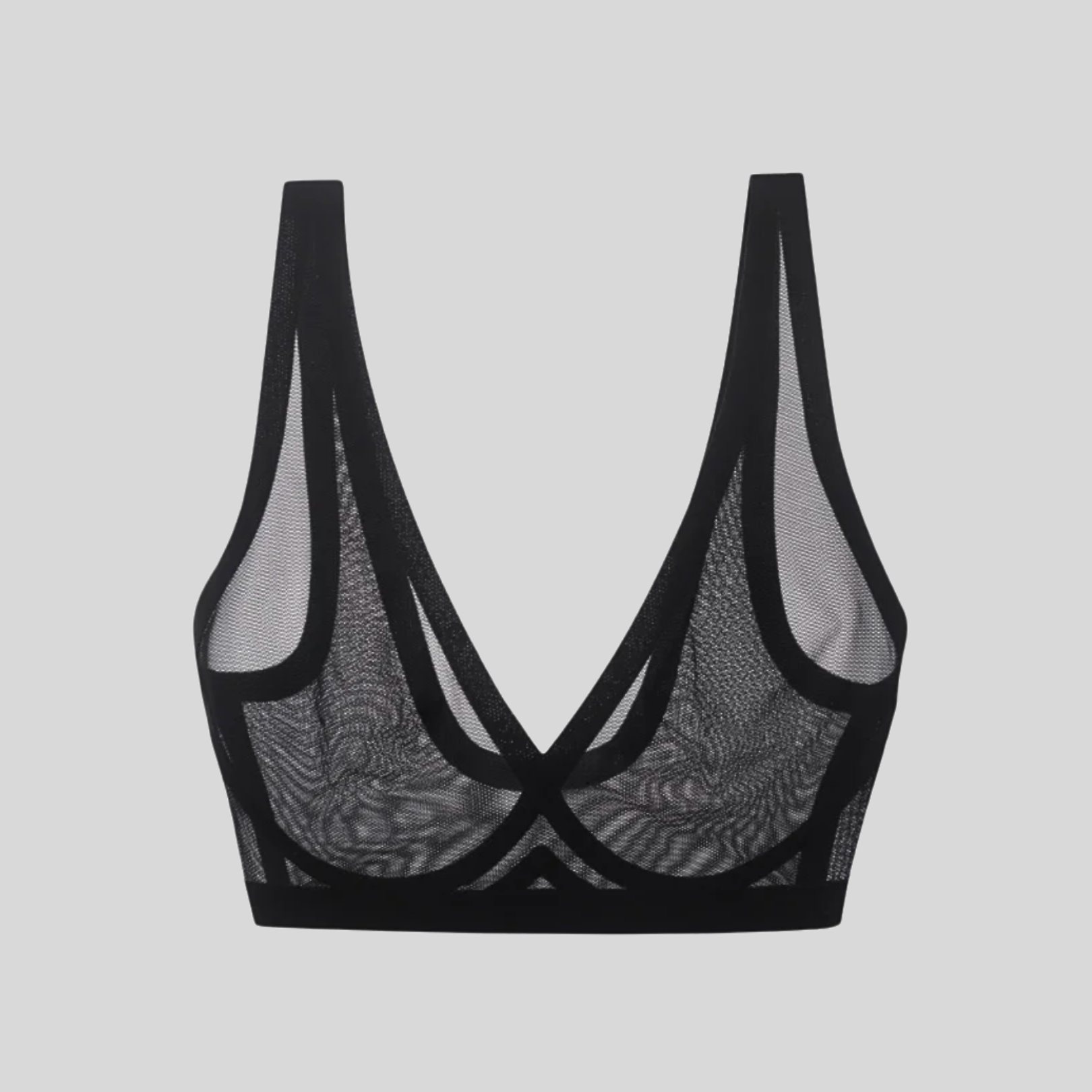 A black sheer mesh bralette with thick trim and wide straps, against a light gray background.