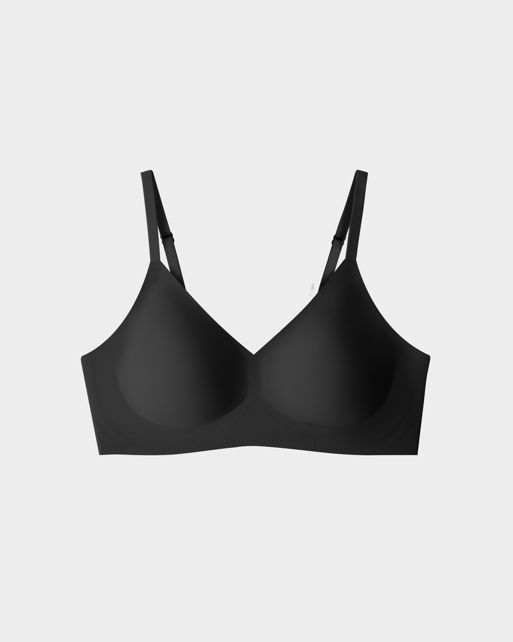 Black seamless bra on a white background.